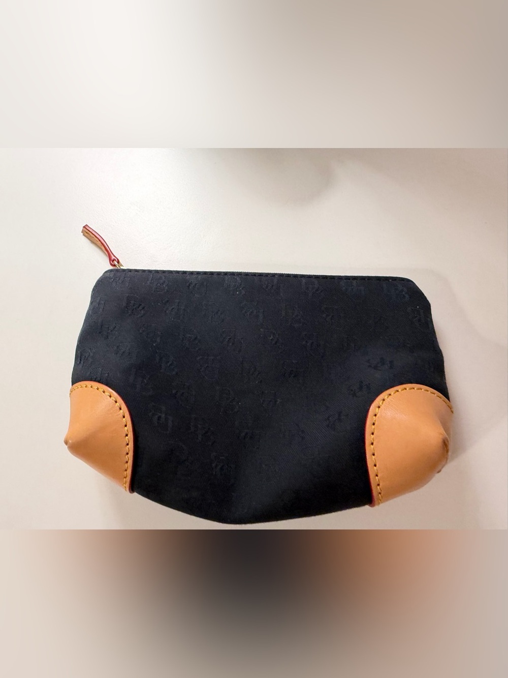 Dooney and Bourke Navy Blue Logo Canvas and Leather Pouch Tan Leather Corners